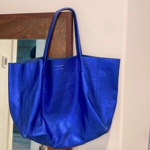 Kurt Geiger tote
Deep blue color, used once 
Has a few blemishes on the bottom